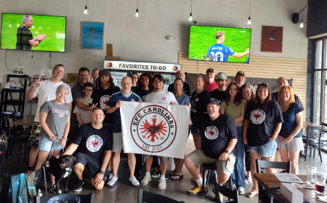 EFC Carolinas supporters gathered for a watch party with their banner